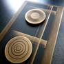 I have always been attracted by the infinite possibilities of transforming metals, especially bronze. 

Their porosity, natural colours, ductility and oxidation are characteristics that have always fascinated me.

' C O M E T E ' : Abstract representation of two comets in the cosmos.

Used technique: overlapping plates in bronzed brass