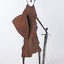 The steel sculpture "Knight on Guard" loosely follows my previous silhouette and figural stylizations. However, the overall tone is different both in the form of stylization of the body and the focus on the small details that are decisive for the artwork and which are characteristic of the image of a knight.
The theme itself, the figure of a knight on guard, is not an image of a warrior, but a knight for whom honor and pride were something for which he was willing to die. The theme is the guardian of honor, loyalty and honesty.
An old rusted sheet metal is used on the body, which is partially embossed so that the surface sculpture is completed by shadows. The other parts are forged.
The sculpture is signed on the base.