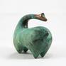 This artwork belongs to the Llamas serie.
Llamas are domestic animals used by the peoples of the Andes Mountains from thousands of years ago. 
This Large Looking Back Green Llama is part of the latest phase of the LLamas Serie. It reaches a new vanishing point in this serie.
“I wanted to stablish an iconic figurative piece which represent a sacred animal of the Andes: The Llama”, said the artist.