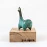 This artwork belongs to the Llamas serie.
Llamas are domestic animals used by the peoples of the Andes Mountains from thousands of years ago.
This piece belongs to the latest year of the Llamas Serie (2016-17), Jesus searched to add more motion for his llamas.
This is the smallest version of the Curved Green Llama.
“I wanted to stablish an iconic figurative piece which represent a sacred animal of the Andes: The Llama”, said the artist.