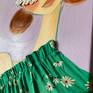 Upcycled green textile with daisies