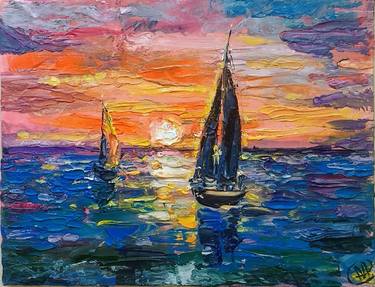 Sailing boats  on sunset thumb