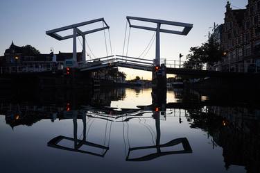 Traditional Dutch bridge across the river thumb