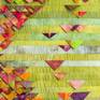 Textile is my medium. I use fabrics as painter uses paints. Usually I dye them by myself to get rich, intense and varied colors, such as colors of fall in Poland, specially of the falling leaves. Thus the title of my work. My "leaves" are triangle-shaped, because I folded them like prairie points, typically used in american quilts.