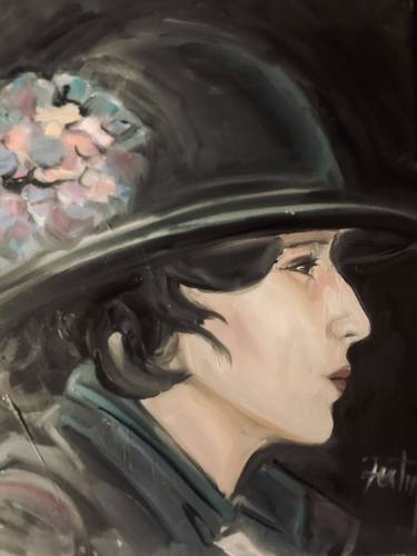 Woman in black hat with hydrangea thumb