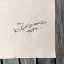 Signature on the back.