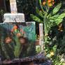 Plein air oil painting of a cactus blooming in the backyard.
