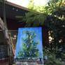 Plein air oil painting of the lemon tree in the backyard.