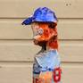 I made a series of baseball players out of cardboard. Painted with gesso and acrylic paint.