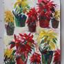 Still life of red and yellow poinsettias done in watercolors.
