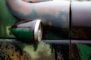 Old, Wet Headlight Of An Abandoned Truck thumb