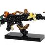 In the flying gun free standing sculpture, I wanted to express the contrast between the lightness of the butterfly and the heaviness of the weapon. Weapons kill and butterflies are symbol of immortality.