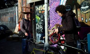 Man With Chair On His Head Brick Lane Market London Uk