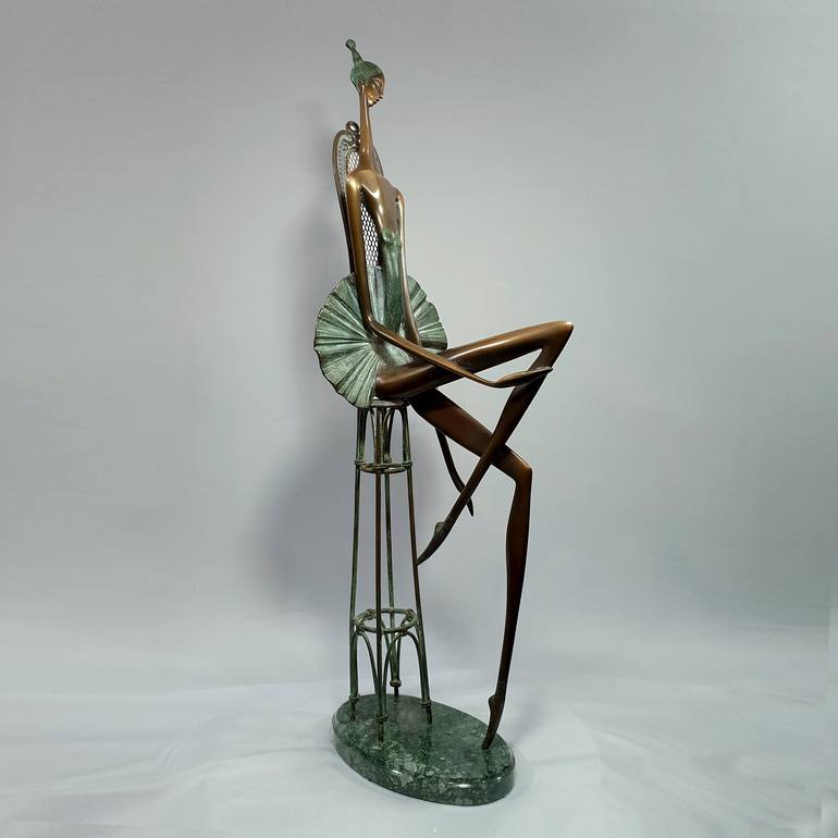 Ballerina on chair. - Print