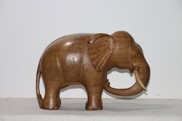 handmade wooden elephant thumb