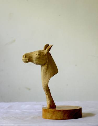 wooden handmade horse thumb