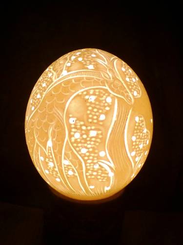Giraffes carved on an Ostrich Egg thumb