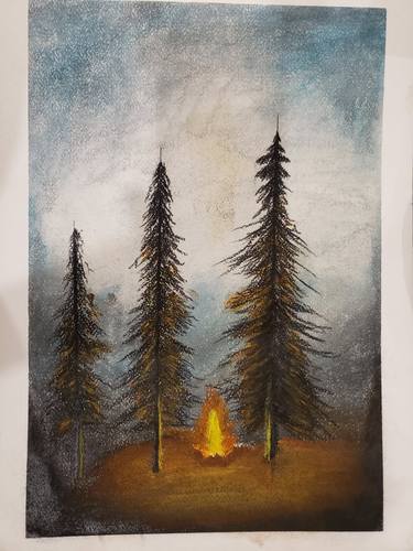 Burning fire beneath the trees thumb