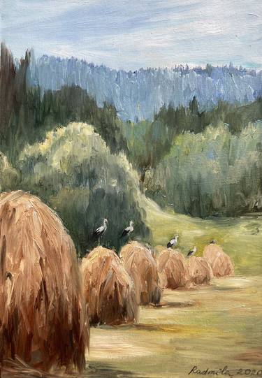 Storks in the hay thumb