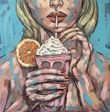 Woman drinking milkshake thumb