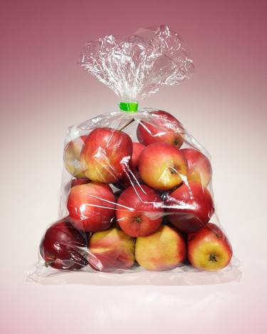 Small apples in a plastic bag thumb