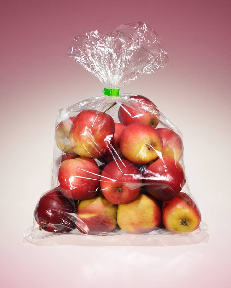 Small apples in a plastic bag Photography by Masumi Shishido