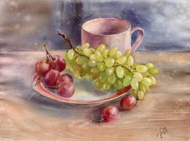 Still life with grapes on a plate and a cup on the table. thumb