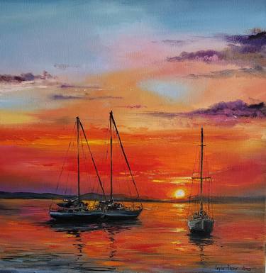 Sailing boats at sunset thumb