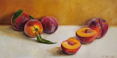 Peaches on table with white tablecloth still life thumb