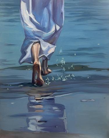 Woman running  to the sea thumb