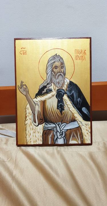 icon of the Holy Prophet Elijah, a hand-drawn icon and a hand-gilded icon. handwork. thumb