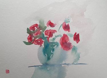 Red flowers in vase thumb