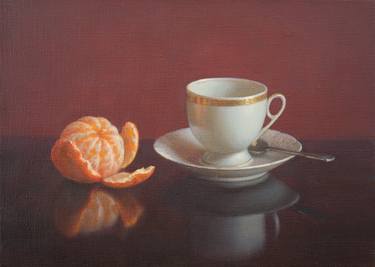 Cup of coffee and tangerine thumb