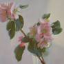 The strong light vibrates on flowers and leaves. The work is painted from life.
