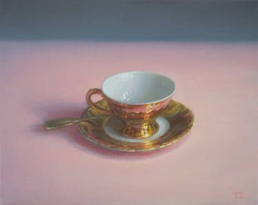 Coffee cup on pink tablecloth thumb