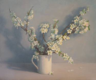 Flowering branches in a white mug thumb