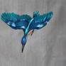 The Kingfisher is dark blue and green. Please watch next image to see the change in color depending on the angle of view.