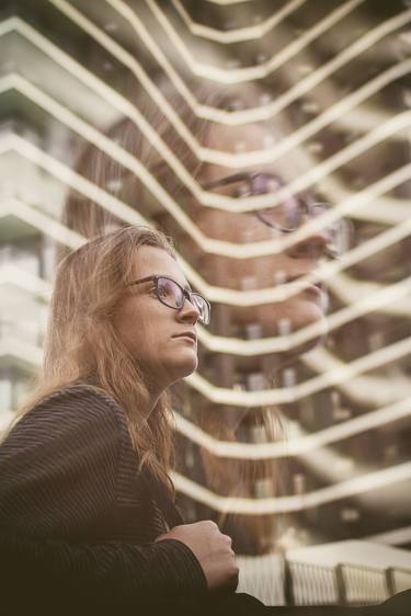 A handsome guy in glasses with long hair on the background of a high-rise building - Limited Edition of 3 thumb