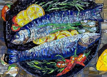 Mosaic. Hot dish with fish in a frying pan thumb