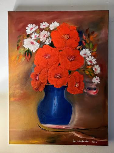 Red poppies in blue vase thumb