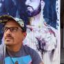 Artist Brenden Sanborn next to the final work