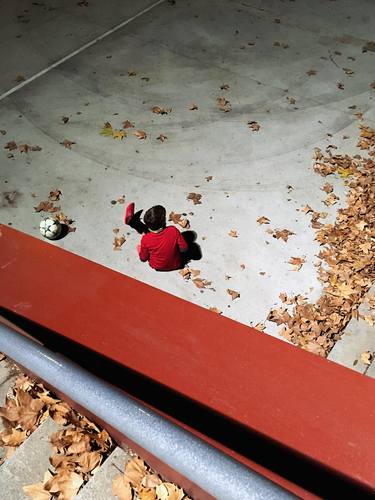 Composition of boy and ball in Parc de l'Espanya Industrial thumb