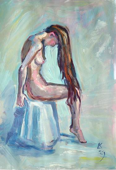 Nude woman with long hair sitting thumb