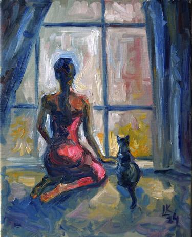 A girl in a red dress and a cat by the window thumb