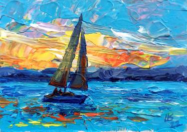 Seascape sunset with a sailboat thumb