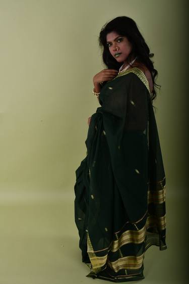 Woman in green saree thumb