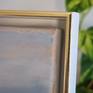 floating frame in white and gold