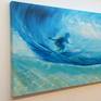 This is an original oil painting painted on a deep edge canvas which has its sides painted so it is ready to hang straight on the wall. This painting is of a surfer viewed from underneath the wave as the surfer glides by.