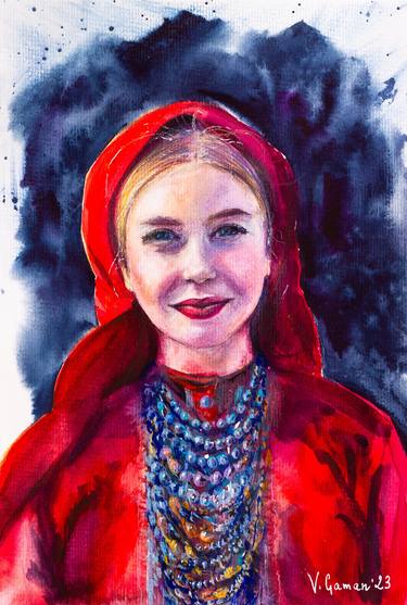Portrait of a young woman in a red folk costume. thumb