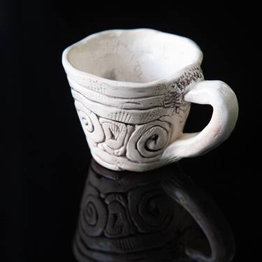 Cup of white clay thumb